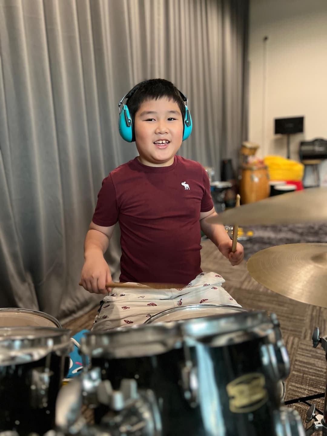 Student playing drums